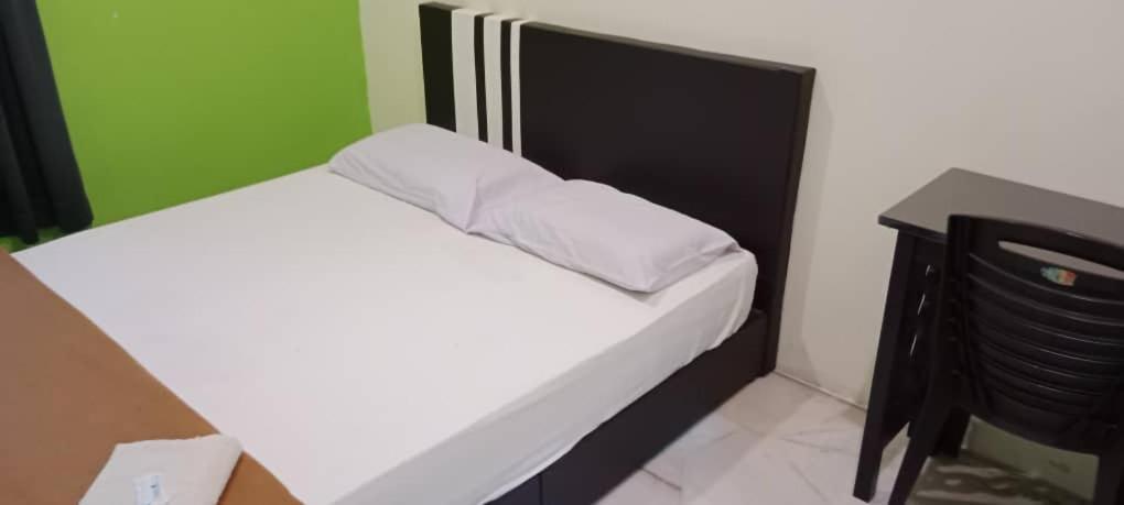 Weng Kong Homestay Slim River Quarto foto