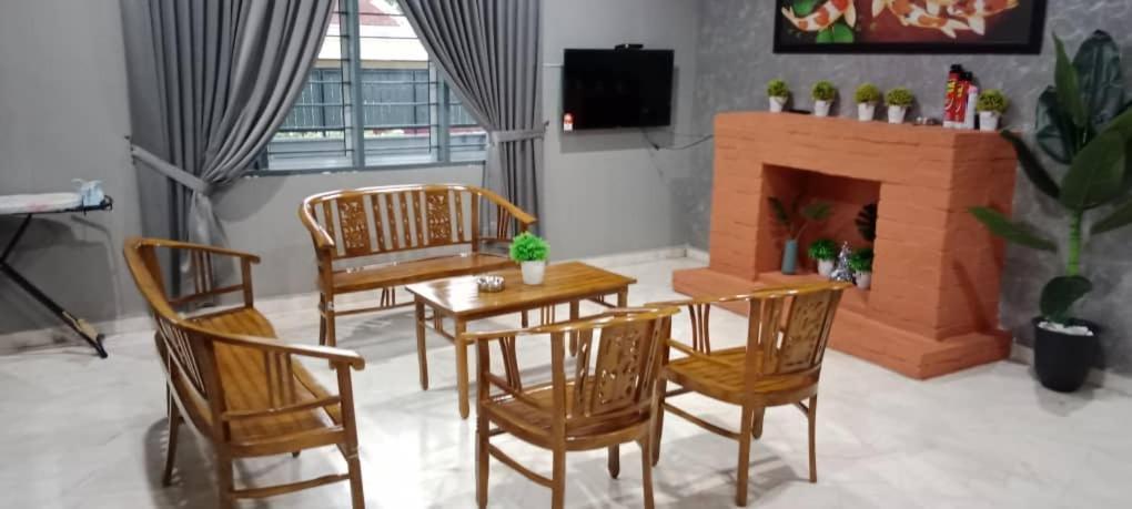 Weng Kong Homestay Slim River Quarto foto